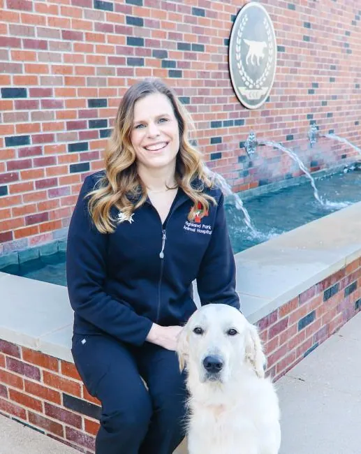 Dr. Gretchen Wright, (DVM) Veterinarian, with a dog